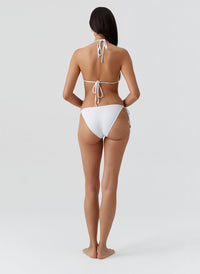 cancun-white-bikini_model_2026_B