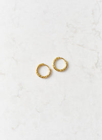 gold-texture-huggy-hoop-earrings_studio_image
