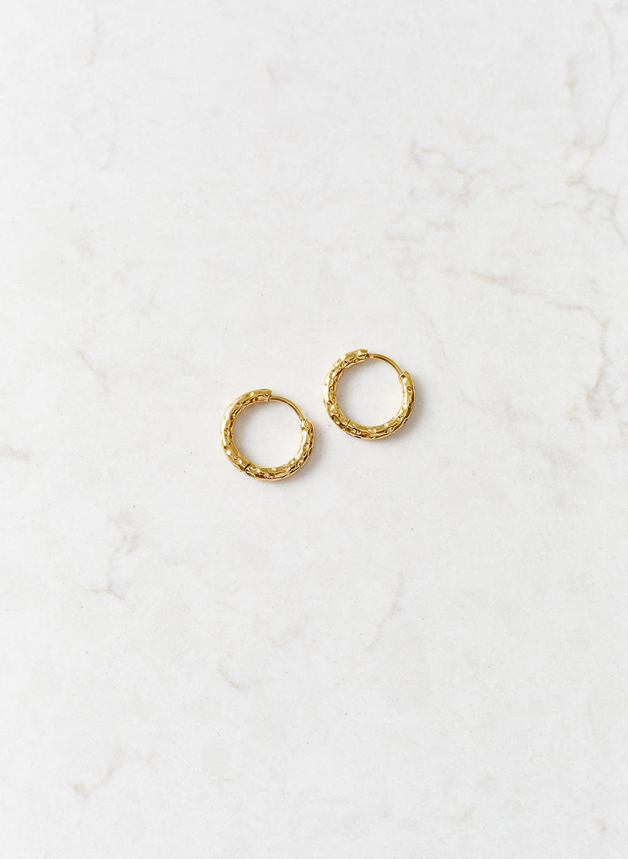 gold-texture-huggy-hoop-earrings_studio_image