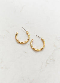 gold-wave-hoop-earrings_studio_image